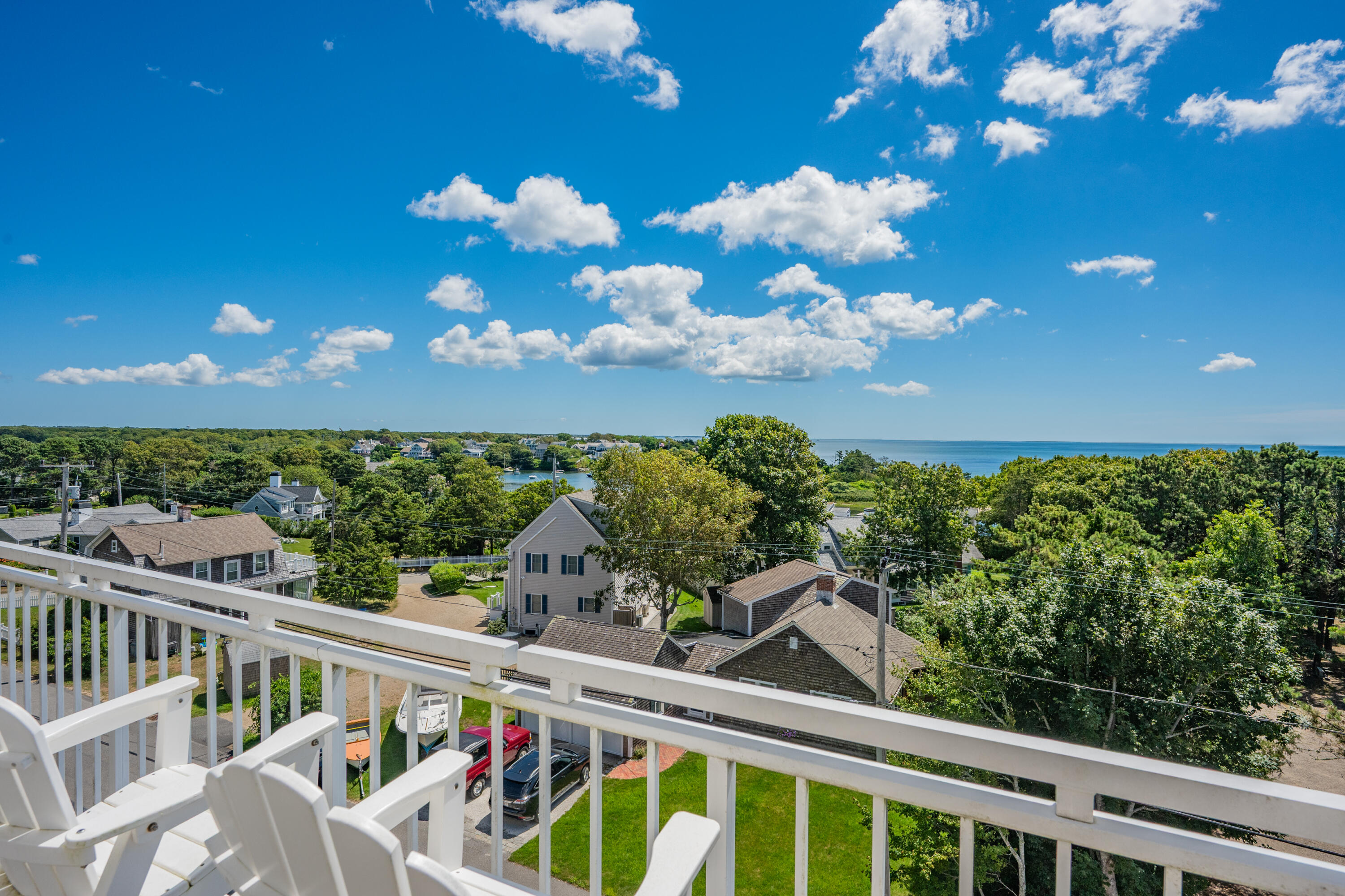 1 Belmont Road, Unit 542 West Harwich, MA 02671 - Photo 2 of 48 a view of a balcony with wooden floor and outdoor space