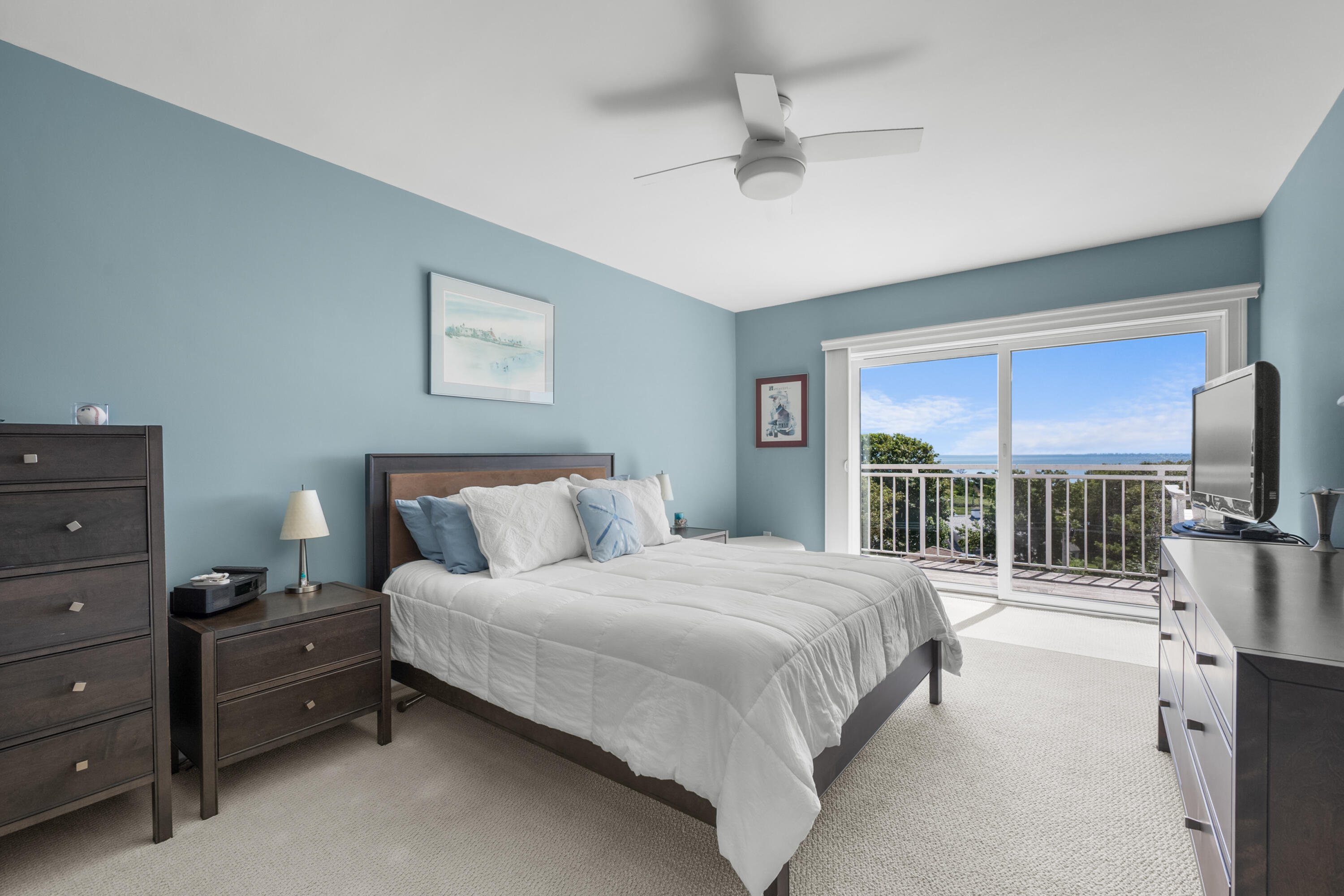 1 Belmont Road, Unit 542 West Harwich, MA 02671 - Photo 22 of 48 a bedroom with a bed and a large window