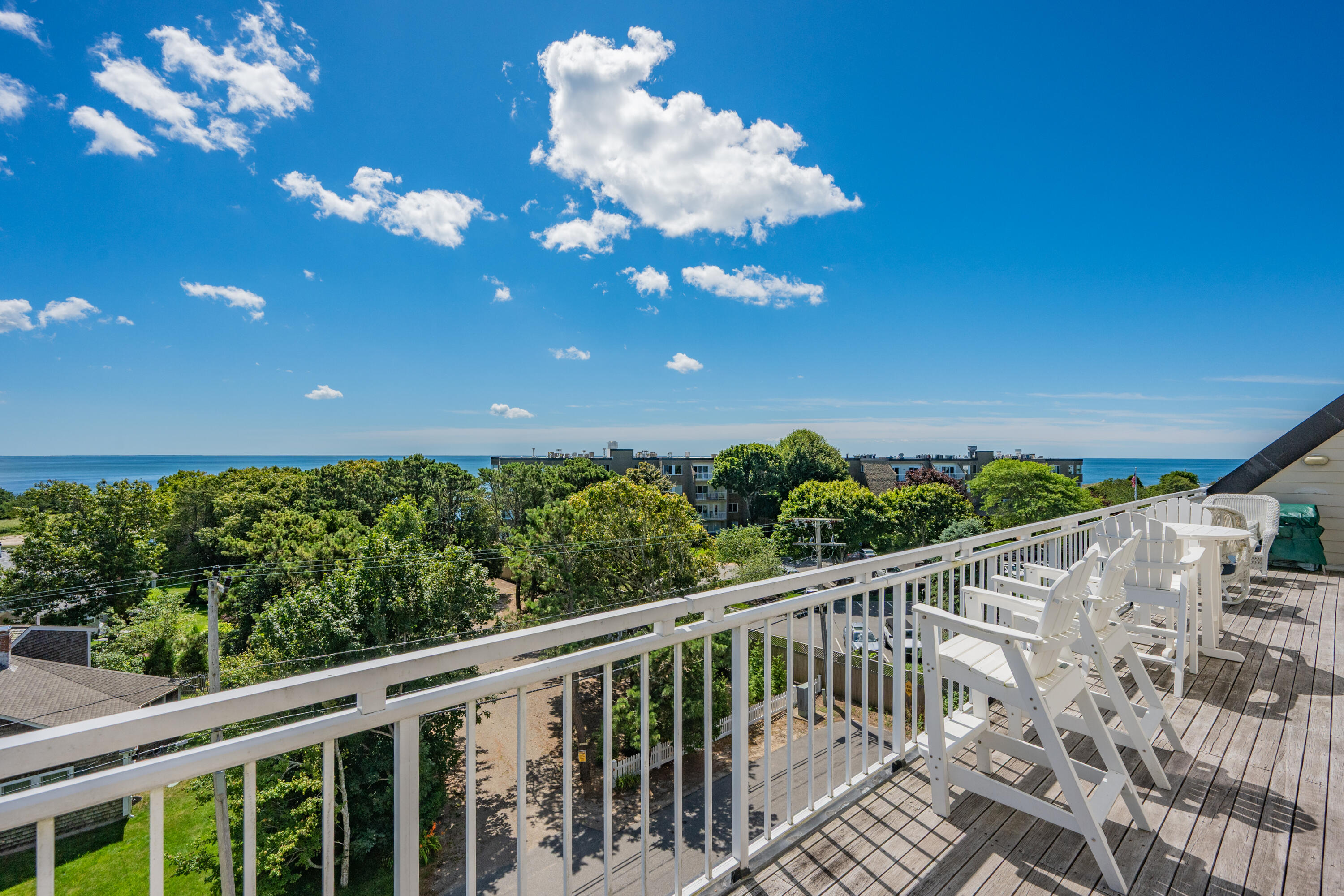 1 Belmont Road, Unit 542 West Harwich, MA 02671 - Photo 26 of 48 a view of a balcony with an outdoor space