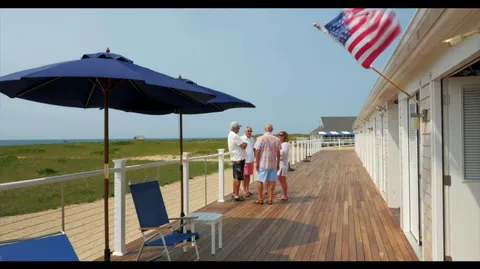 a view of a balcony with chairs