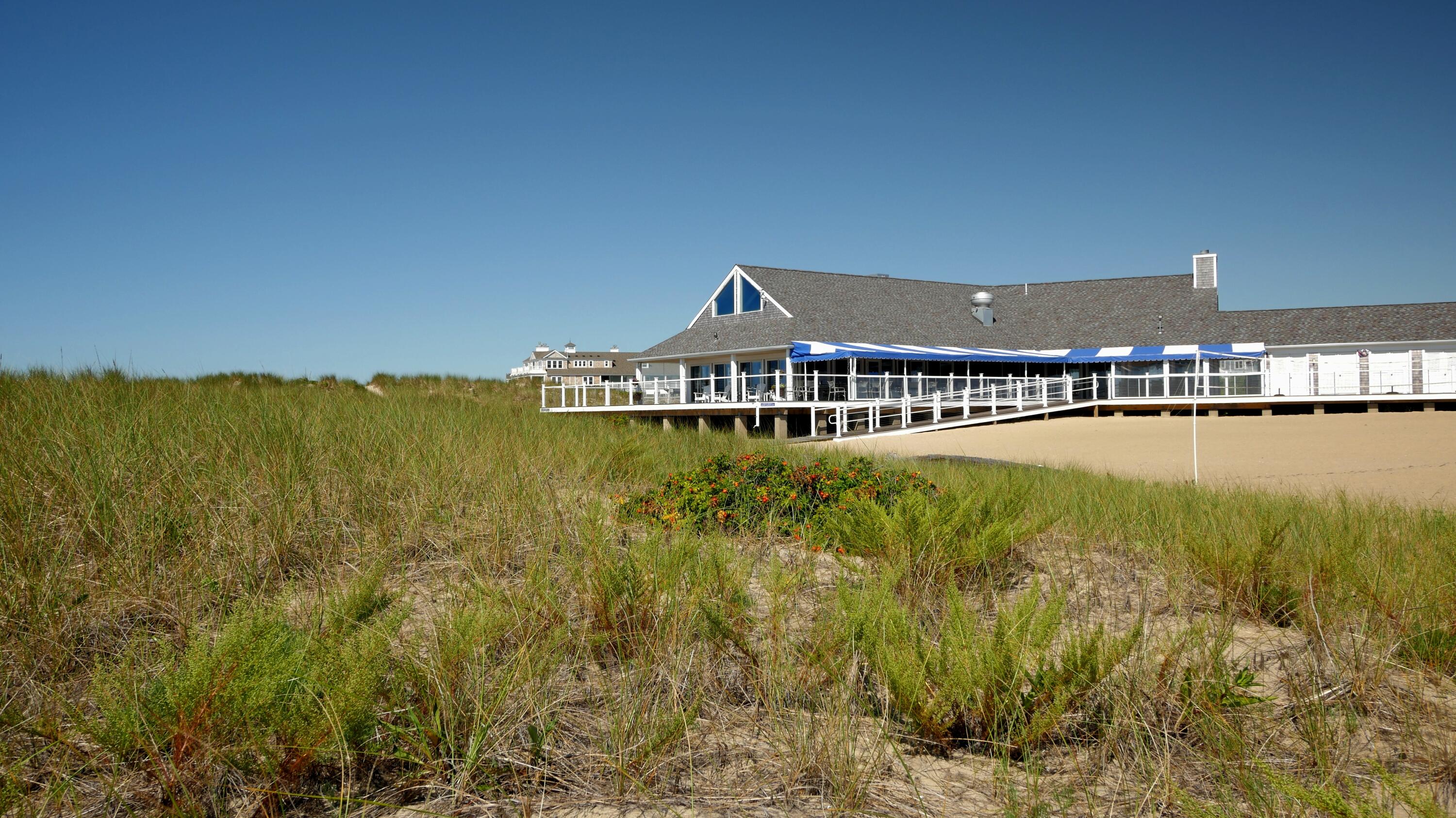 1 Belmont Road, Unit 542 West Harwich, MA 02671 - Photo 36 of 48 a view of a city with tall buildings in front of it