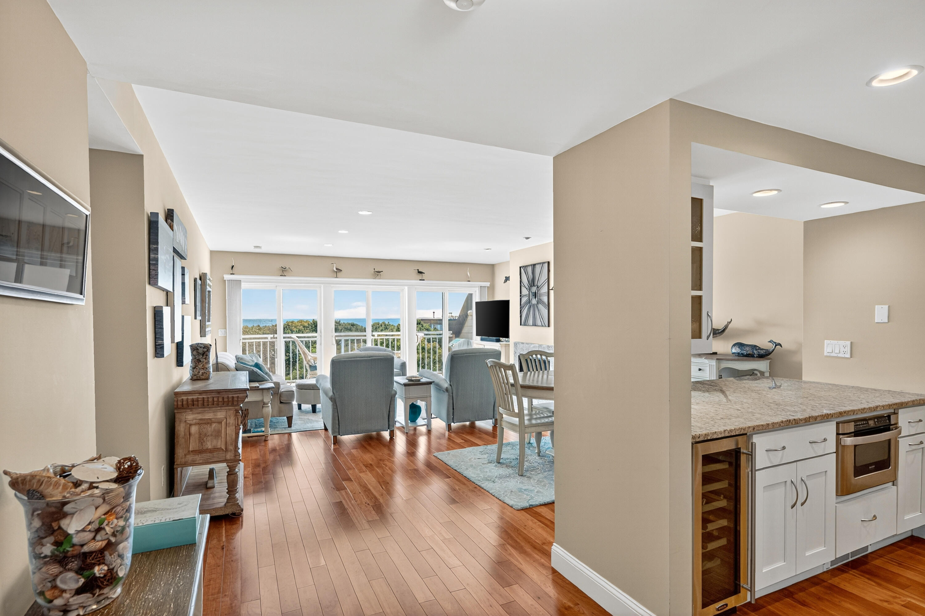 1 Belmont Road, Unit 542 West Harwich, MA 02671 - Photo 4 of 48 a view of a kitchen with furniture and wooden floor