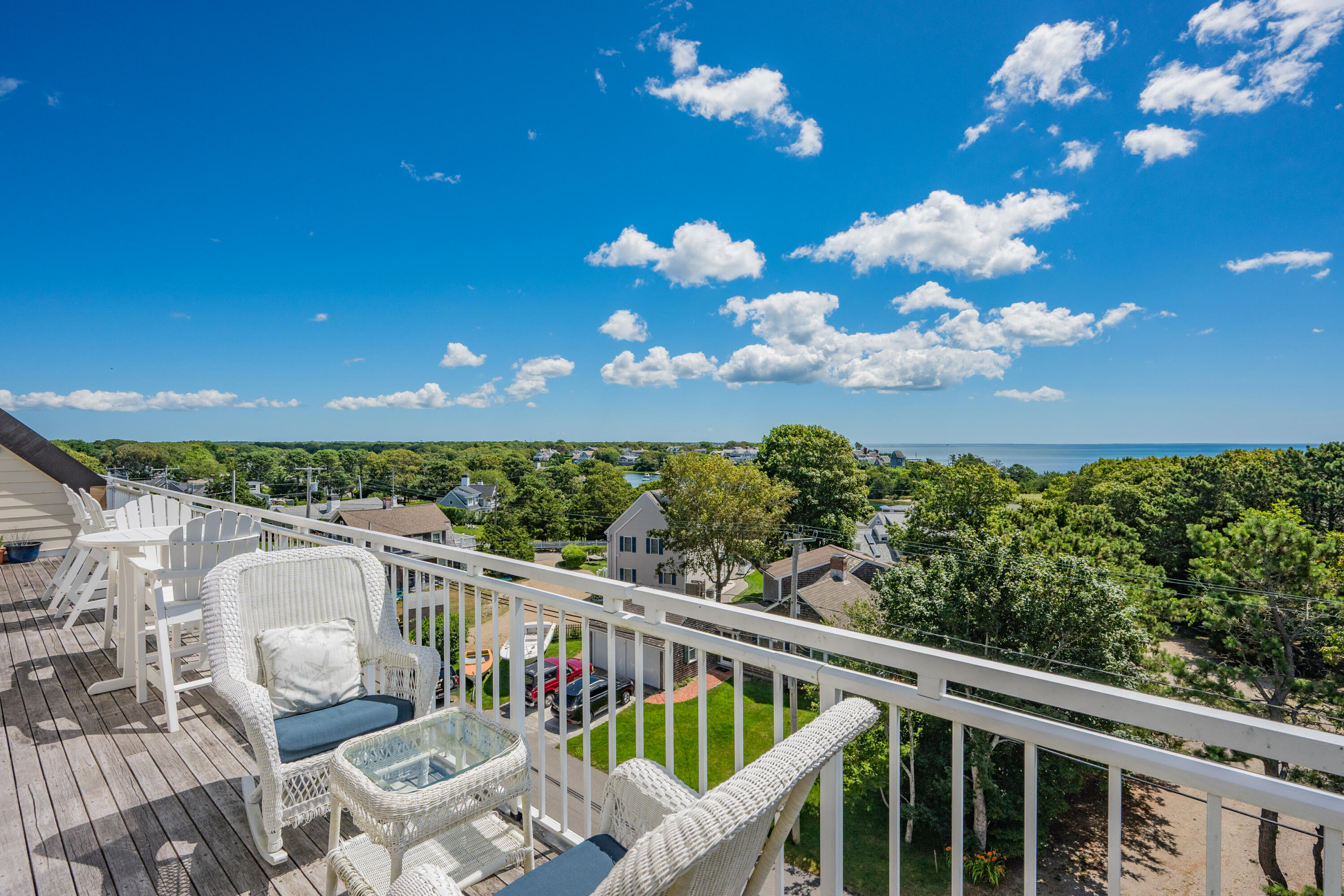 1 Belmont Road, Unit 542 West Harwich, MA 02671 - Photo 46 of 48 a view of a balcony with mountain view and wooden floor