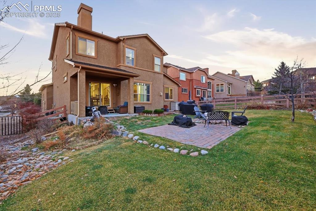 2374 Cinnabar Road Colorado Springs, CO 80921 - Photo 11 of 48 The back yard features two HOA-approved sheds and beautiful landscaping.