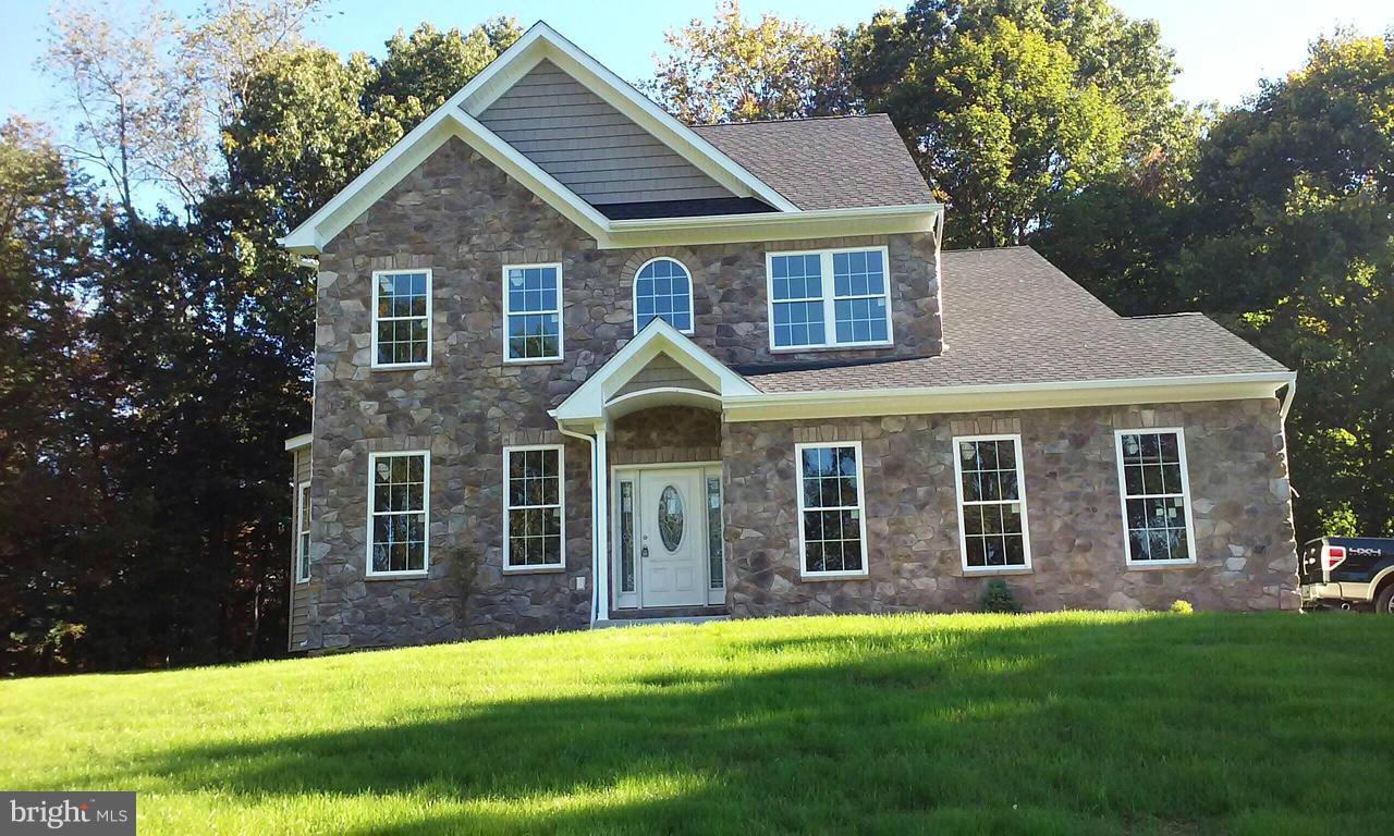 17523 Falls Road Upperco, MD 21155 - Photo 1 of 19 a view of a house with a yard
