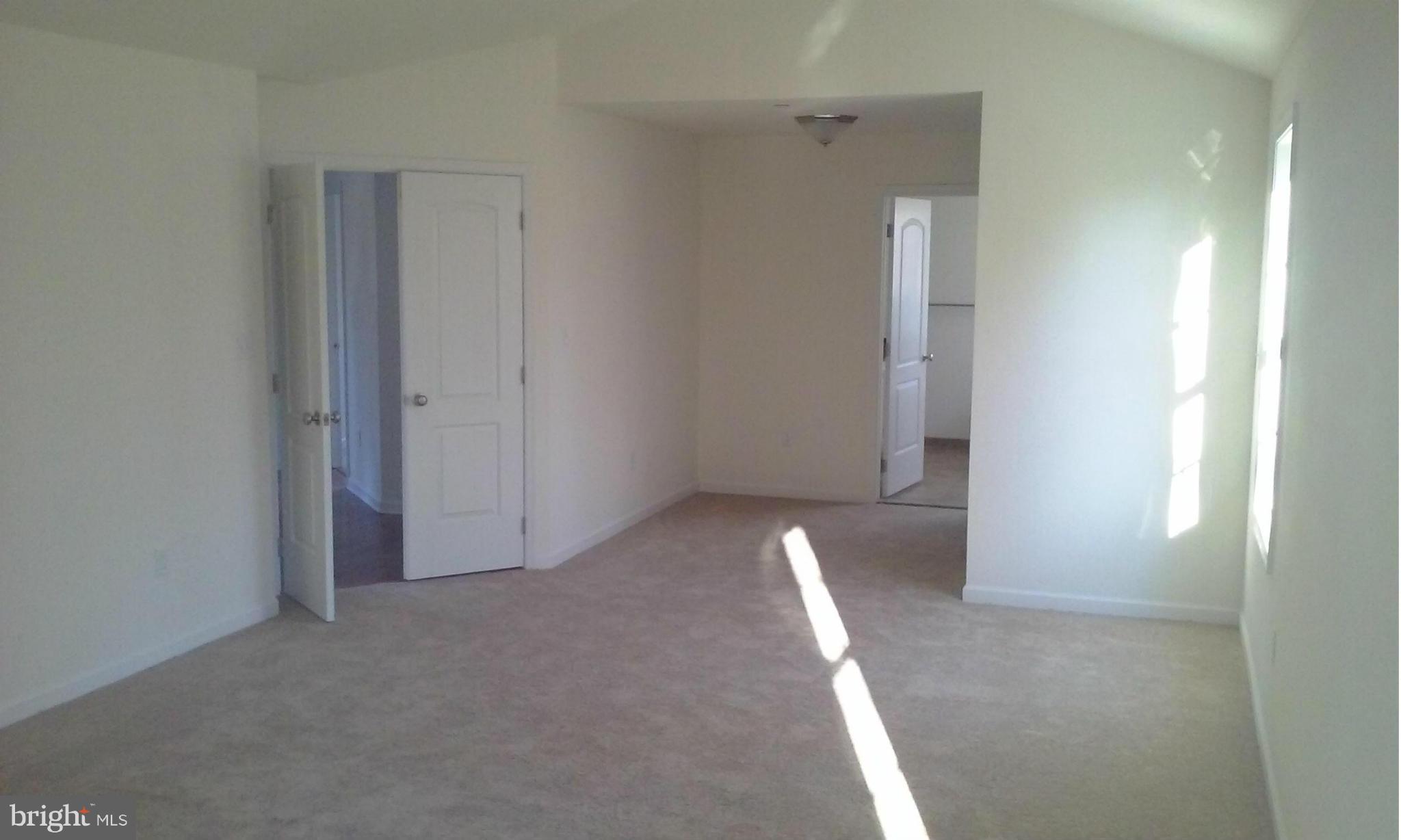 17523 Falls Road Upperco, MD 21155 - Photo 4 of 19 a view of a room with white walls