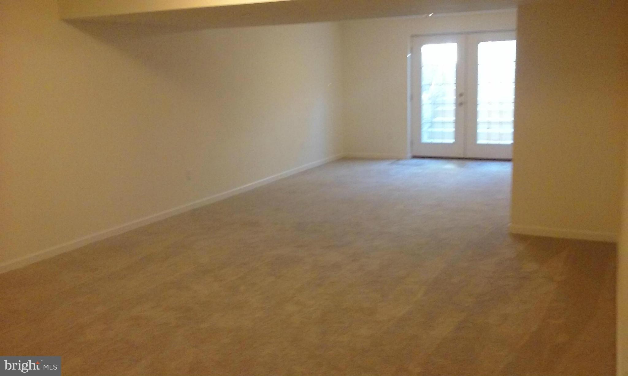 17523 Falls Road Upperco, MD 21155 - Photo 8 of 19 an empty room with windows