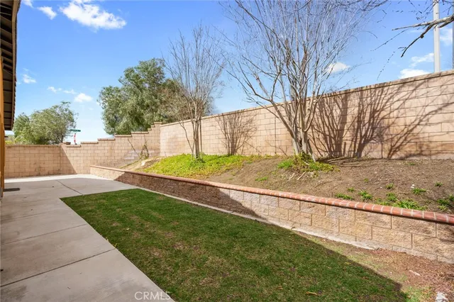a view of backyard with green space