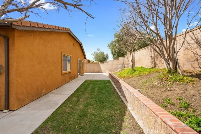 a view of backyard with green space