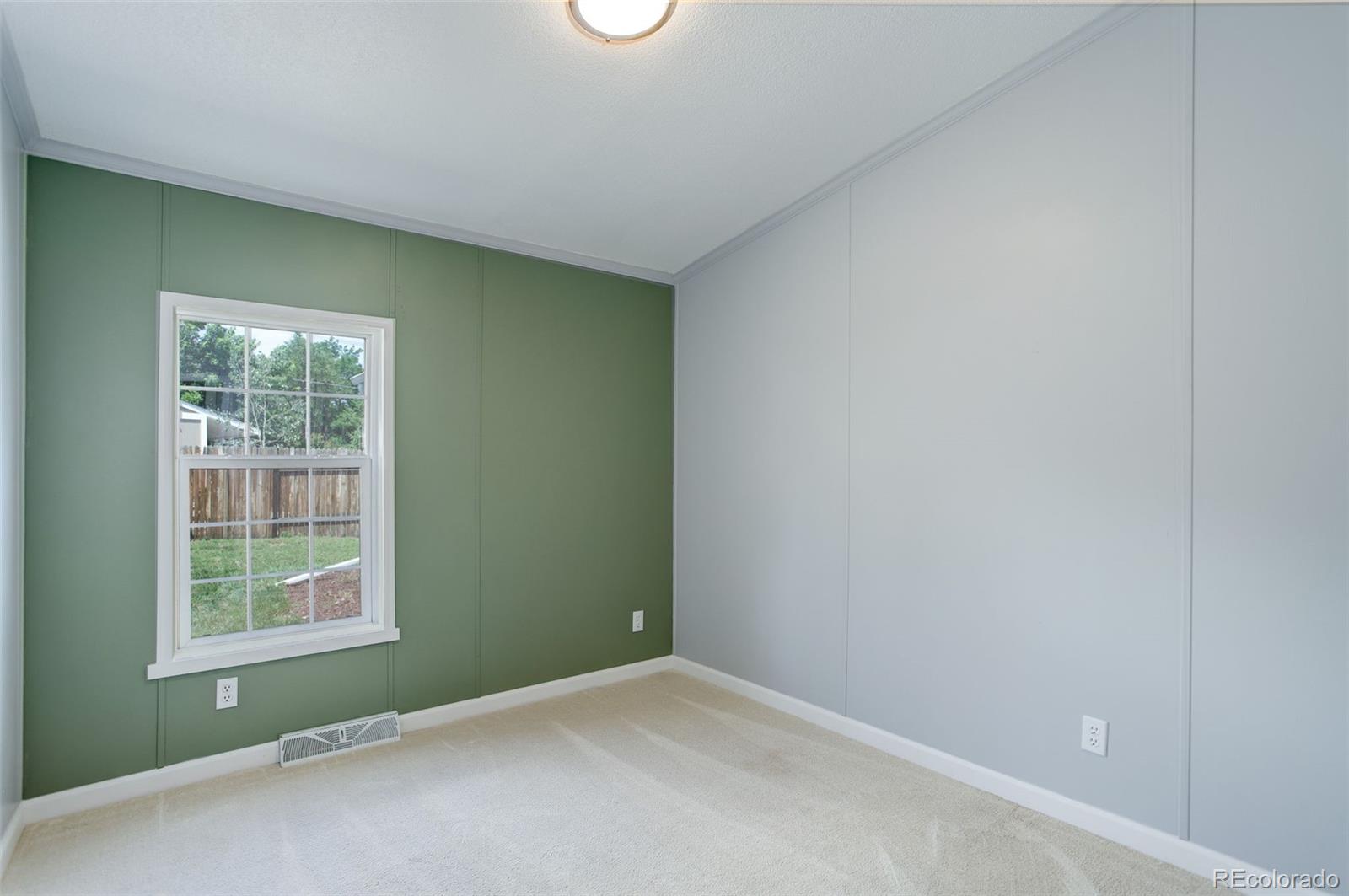5115 West Custer Place Denver, CO 80219 - Photo 18 of 25 an empty room with windows