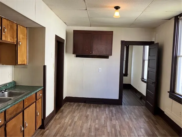 a view of a livingroom with wooden floor