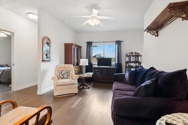 a living room with furniture and a couch
