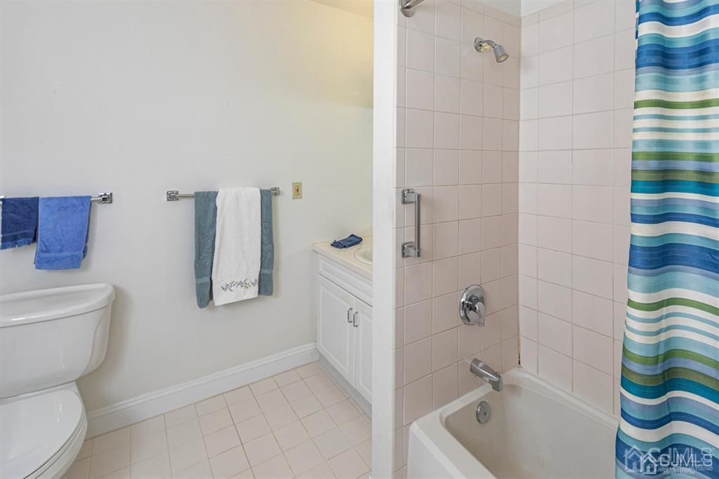 2423 Windrow Drive Plainsboro, NJ 08540 - Photo 18 of 36 a bathroom with a toilet and a shower