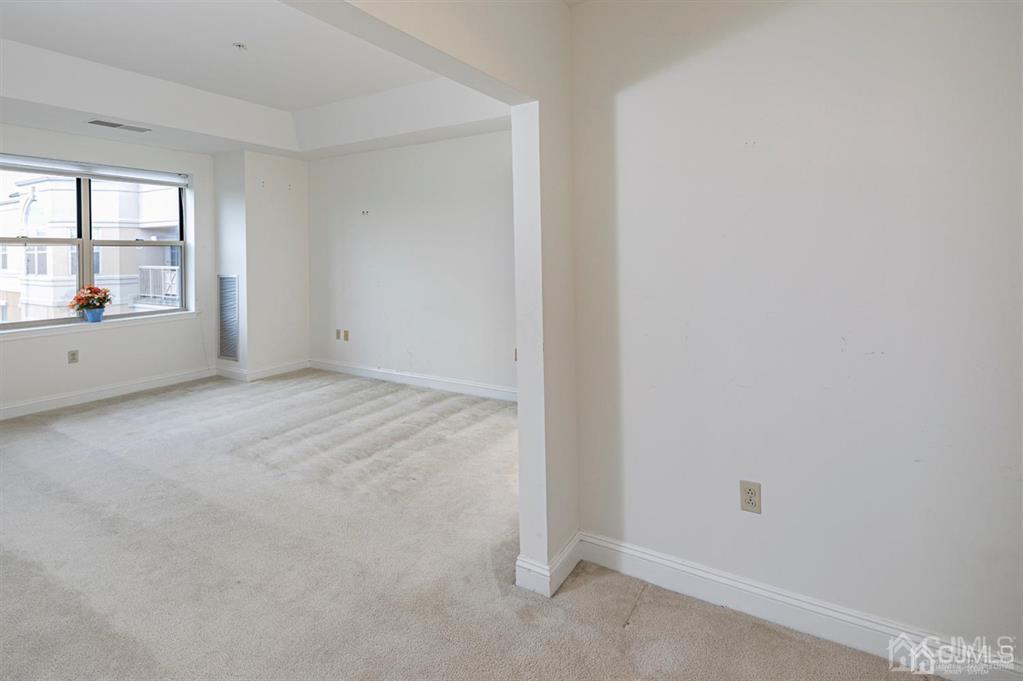 2423 Windrow Drive Plainsboro, NJ 08540 - Photo 19 of 36 a view of an empty room with a window