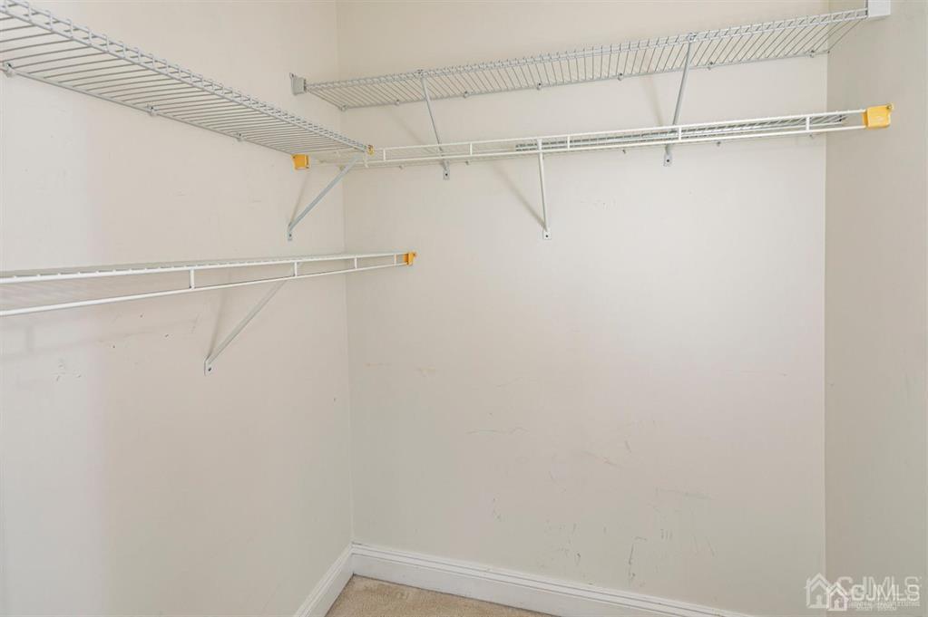2423 Windrow Drive Plainsboro, NJ 08540 - Photo 23 of 36 a view of a room with racks on the wall