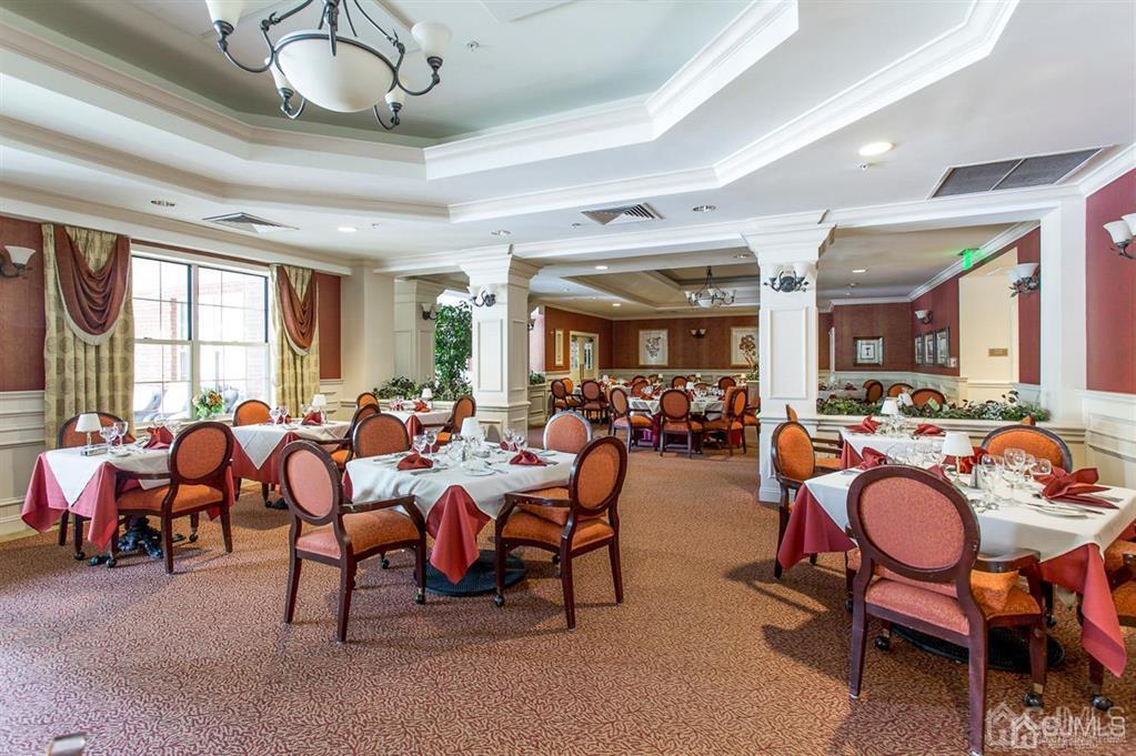 2423 Windrow Drive Plainsboro, NJ 08540 - Photo 28 of 36 a group of people sitting in room with living room