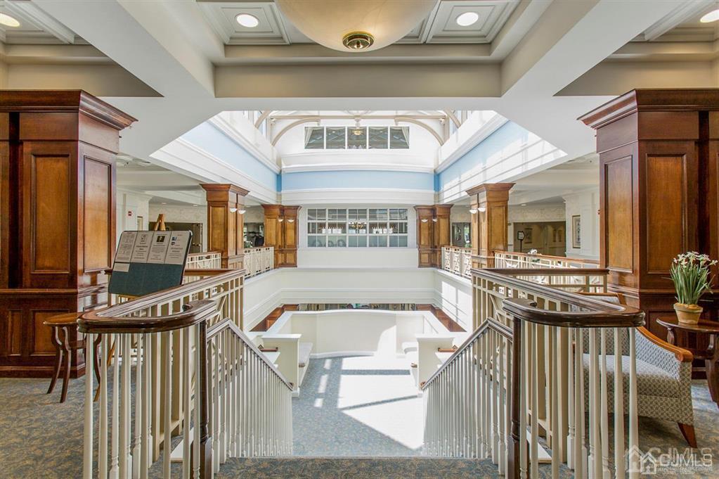 2423 Windrow Drive Plainsboro, NJ 08540 - Photo 3 of 36 a view of a balcony with furniture and a ceiling fan
