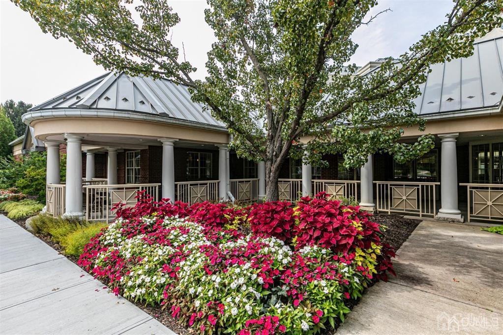 2423 Windrow Drive Plainsboro, NJ 08540 - Photo 31 of 36 a front view of house with flower around