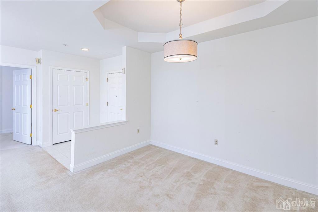 2423 Windrow Drive Plainsboro, NJ 08540 - Photo 8 of 36 a view of an empty room with a window