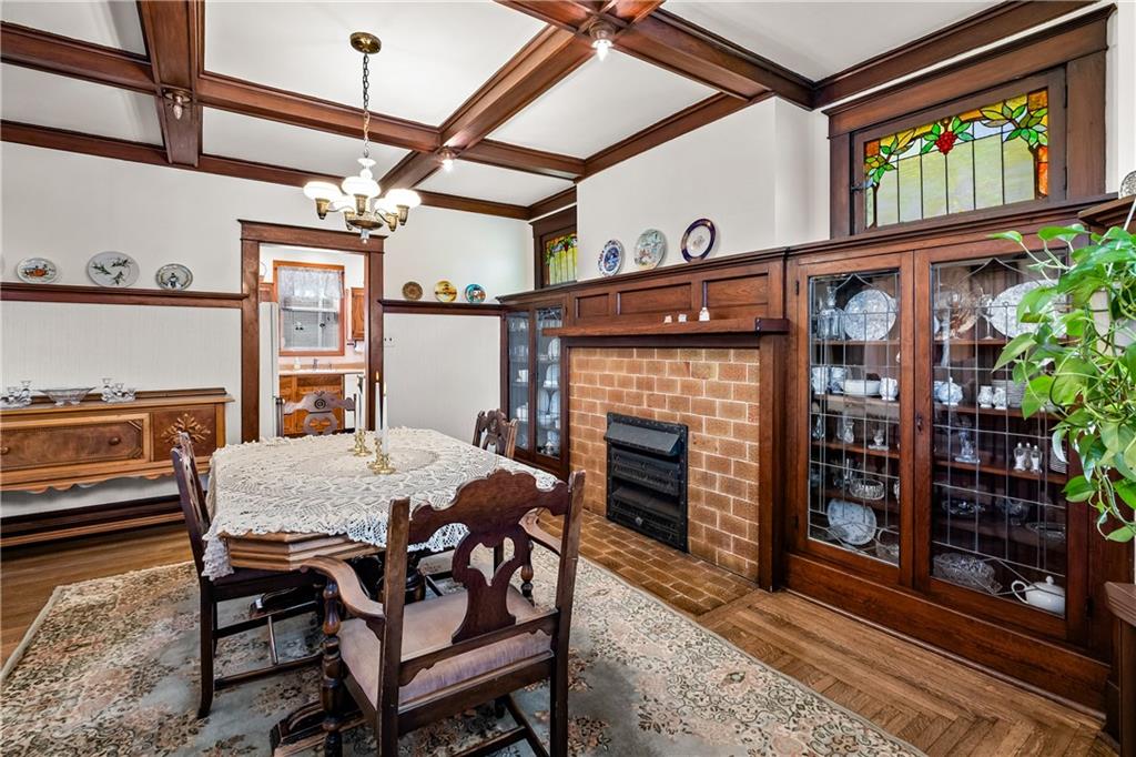 47 Ralston Place Mt. Lebanon, PA 15216 - Photo 14 of 44 Dining room with original built-ins and fireplace—perfect for gatherings