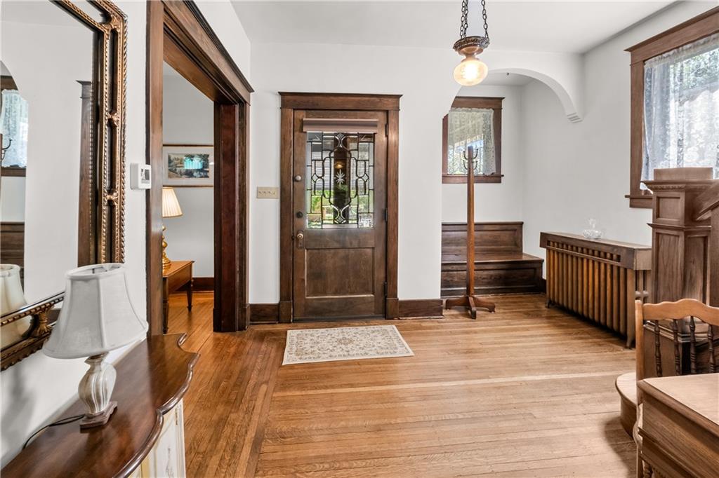 47 Ralston Place Mt. Lebanon, PA 15216 - Photo 6 of 44 Spacious foyer with rich woodwork and built-in bench