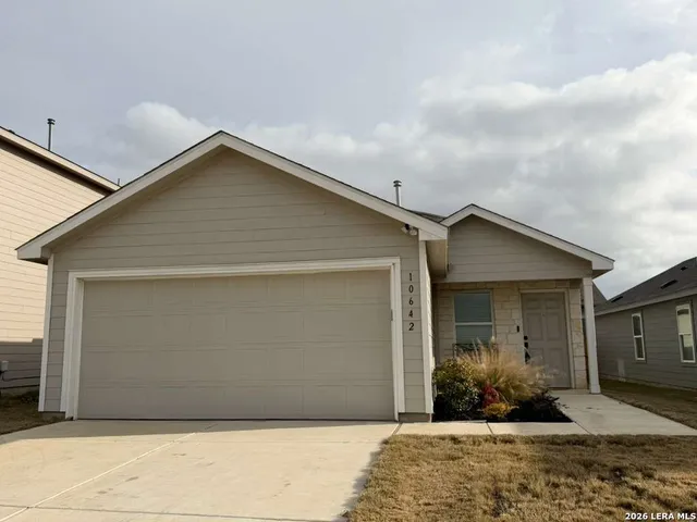 a view of gallery with wooden floor