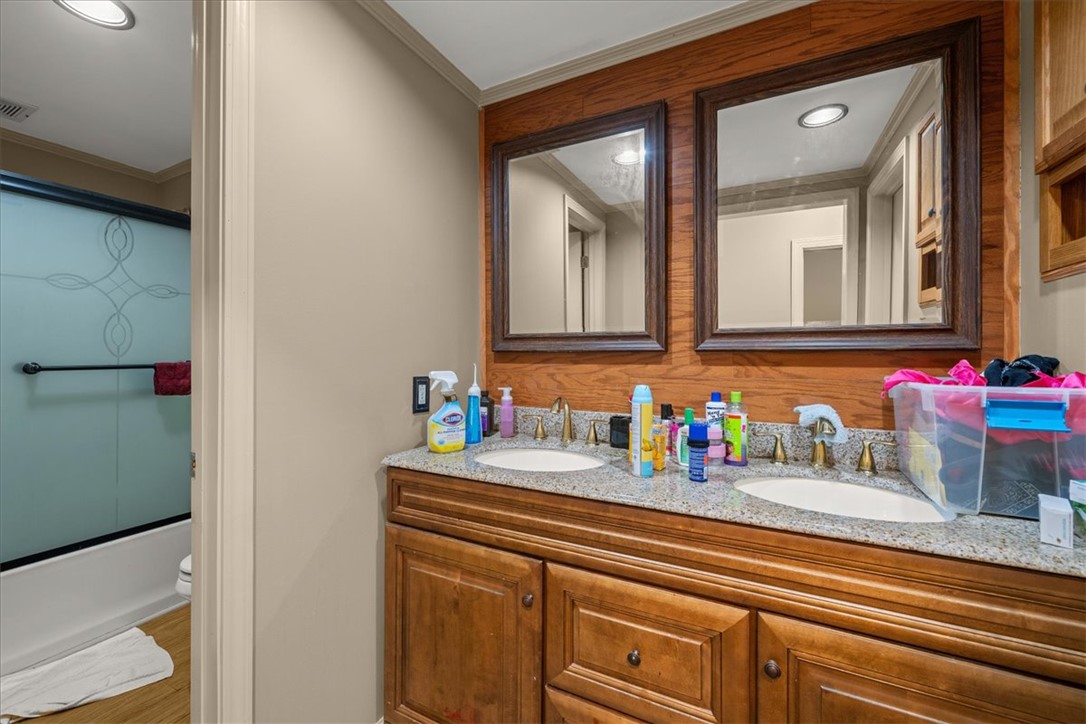 1102 West End Avenue Anderson, SC 29625 - Photo 21 of 28 Double vanities with ample counter space elevate this essential room.