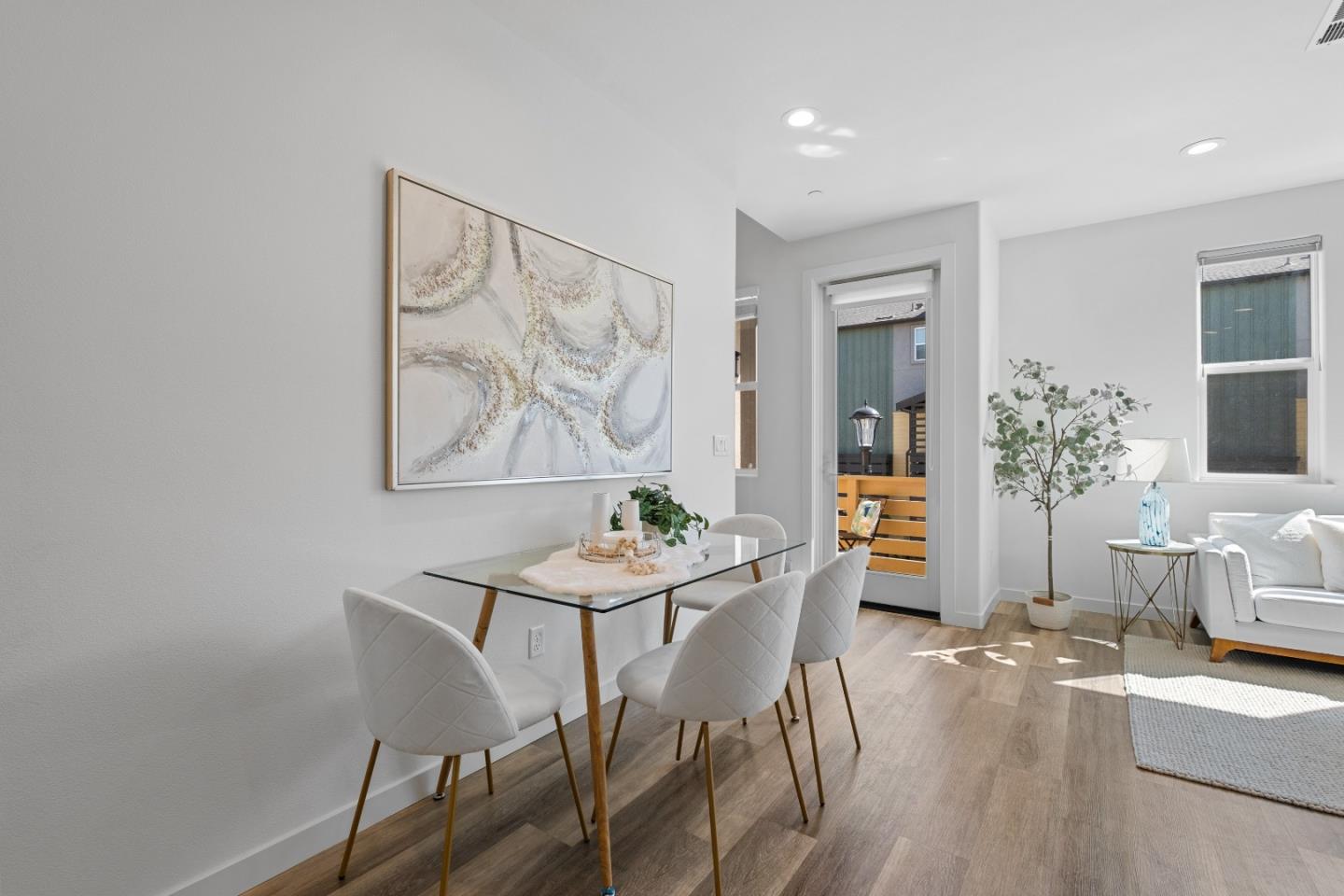 511 Sage Court Milpitas, CA 95035 - Photo 14 of 47 a view of a dining room with furniture and wooden floor