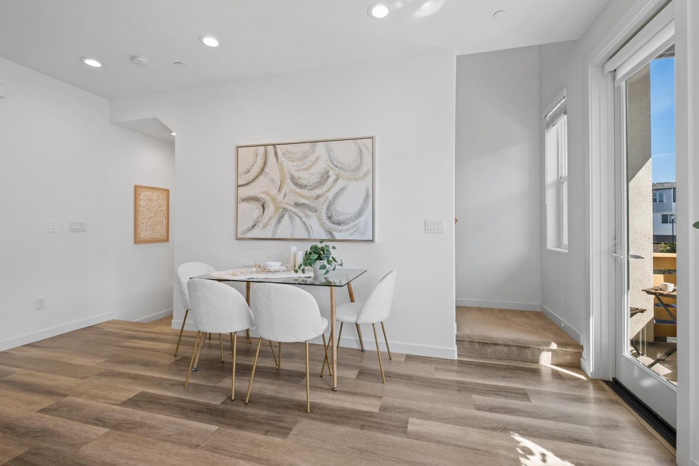 511 Sage Court Milpitas, CA 95035 - Photo 15 of 47 a dining room with wooden floor and breakfast area