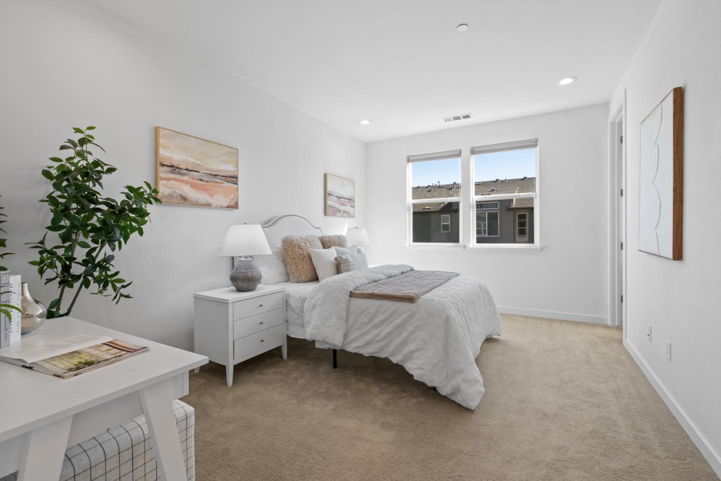 511 Sage Court Milpitas, CA 95035 - Photo 22 of 47 a spacious bedroom with two beds and a potted plant