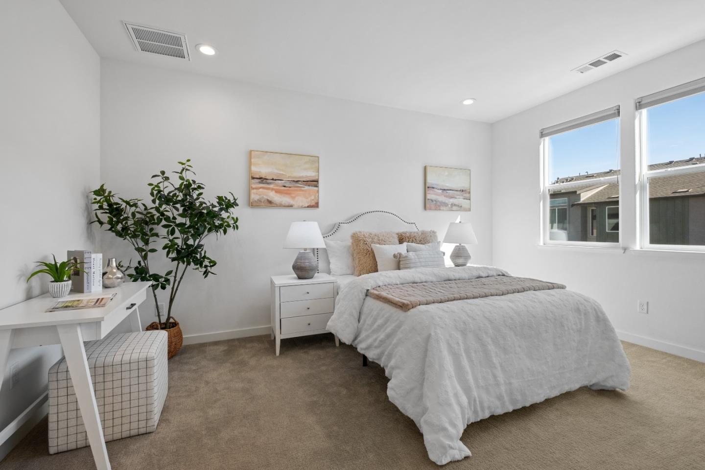 511 Sage Court Milpitas, CA 95035 - Photo 24 of 47 a bedroom with bed and a potted plant