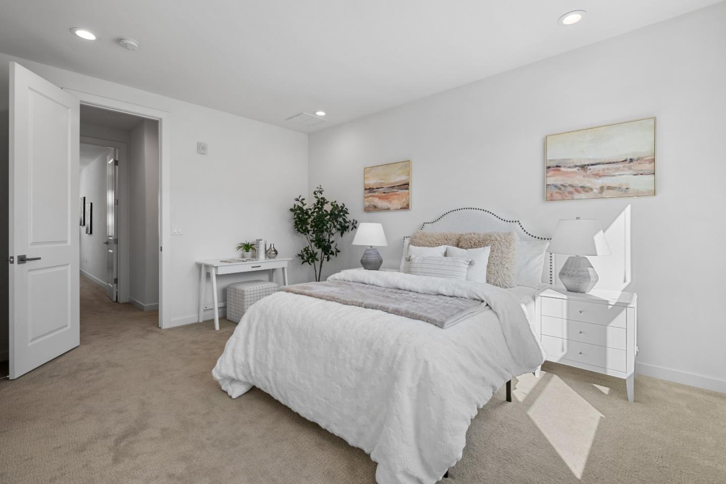 511 Sage Court Milpitas, CA 95035 - Photo 25 of 47 a bedroom with a bed and a potted plant