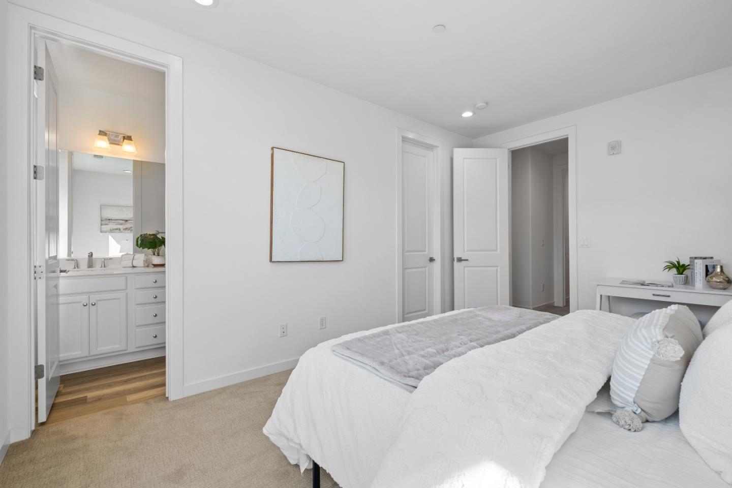 511 Sage Court Milpitas, CA 95035 - Photo 26 of 47 a spacious bedroom with a bed and a bathroom