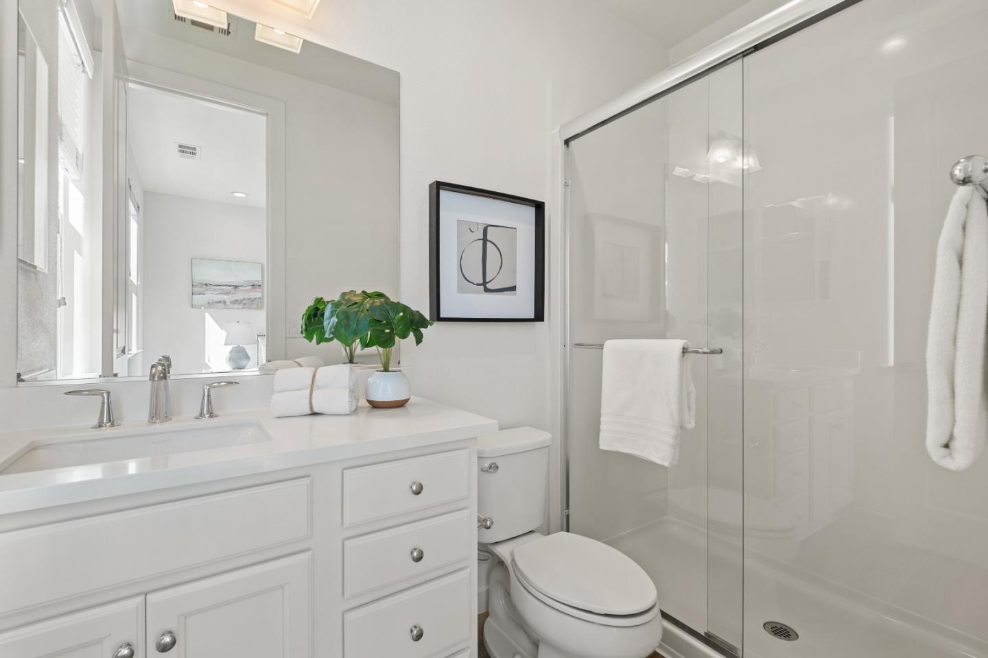 511 Sage Court Milpitas, CA 95035 - Photo 28 of 47 a bathroom with a granite countertop sink a toilet and shower