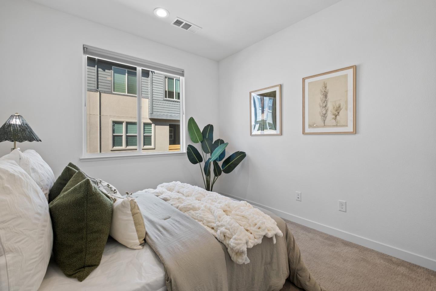 511 Sage Court Milpitas, CA 95035 - Photo 30 of 47 a bedroom with a bed and a window