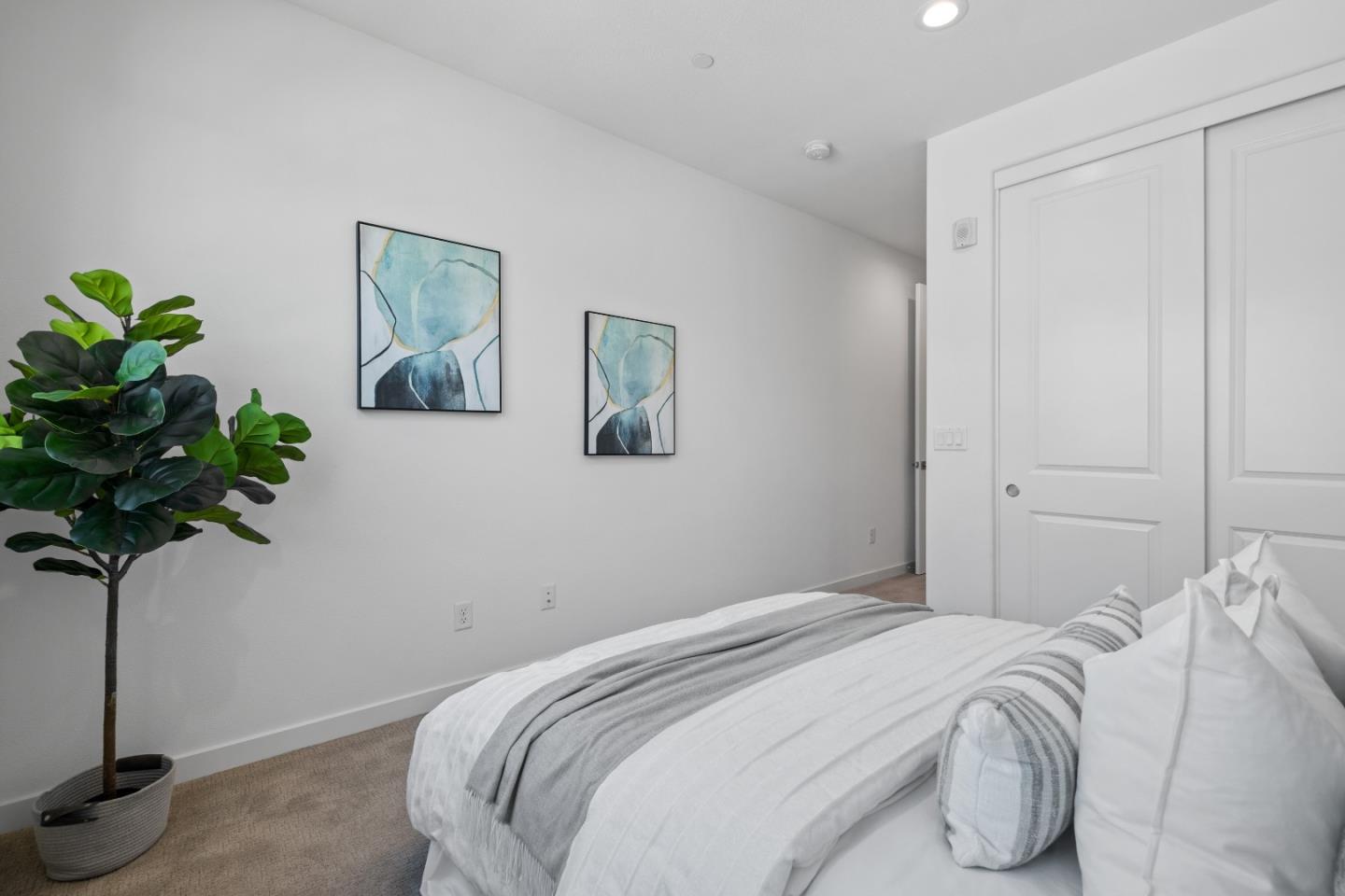 511 Sage Court Milpitas, CA 95035 - Photo 34 of 47 a bedroom with a bed and a plant