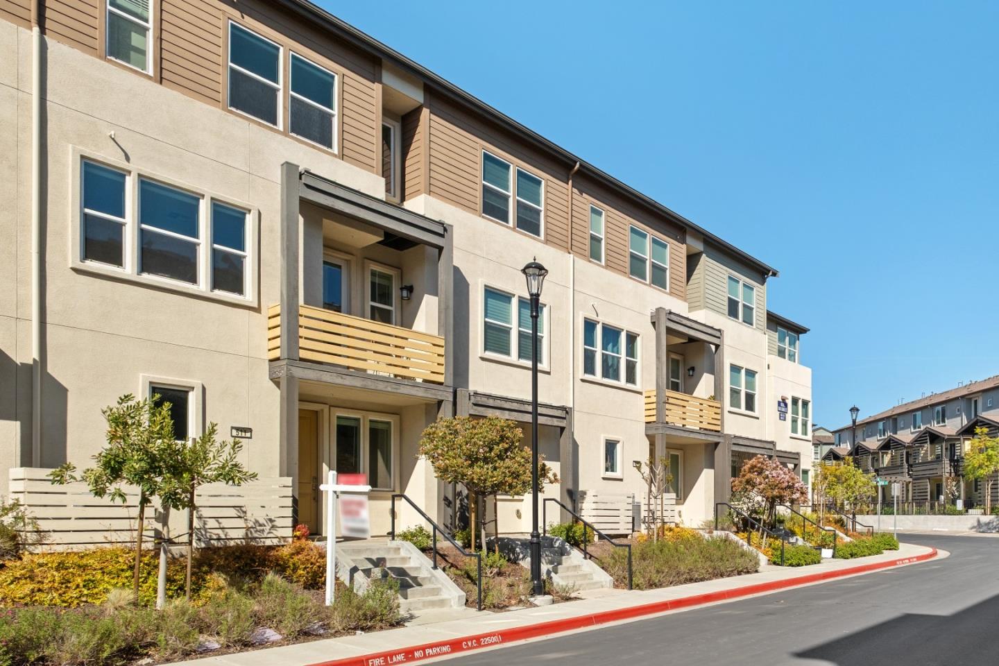 511 Sage Court Milpitas, CA 95035 - Photo 41 of 47 a front view of a building with street view