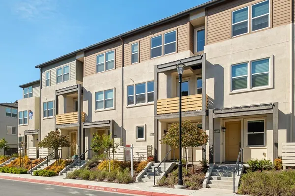 a front view of a building with street view