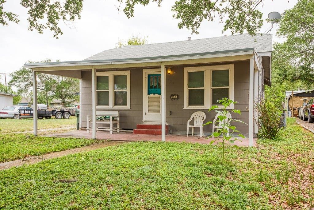 322 Fetick Avenue Taft, TX 78390 - Photo 1 of 34 a house view with a sitting space and garden
