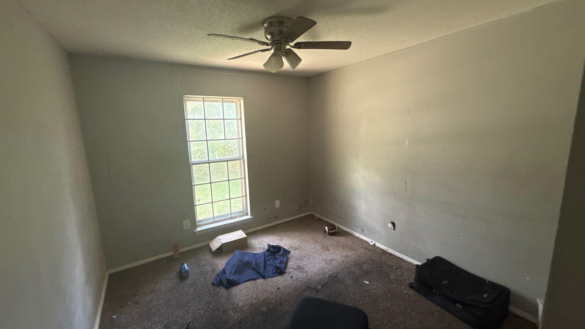 4939 Manson Road Memphis, TN 38109 - Photo 5 of 17 Room featuring a ceiling fan with integrated lighting and a window with white trim