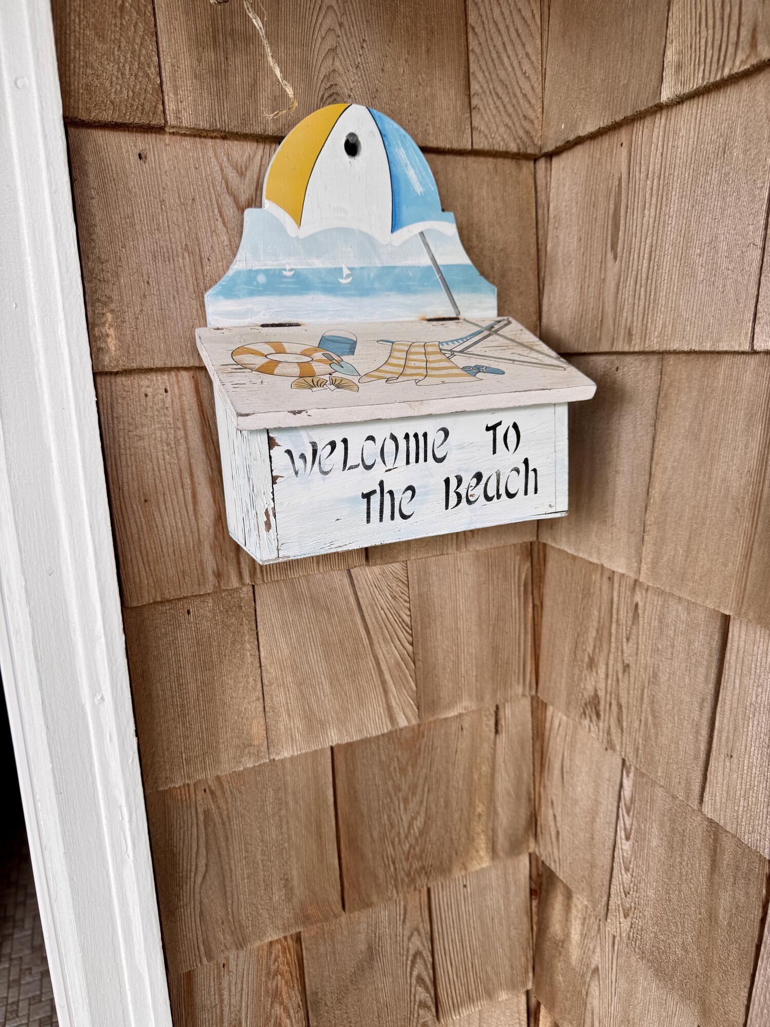 56-58 Uncle Rolf Road Dennis Port, MA 02639 - Photo 38 of 44 a close up of a street sign