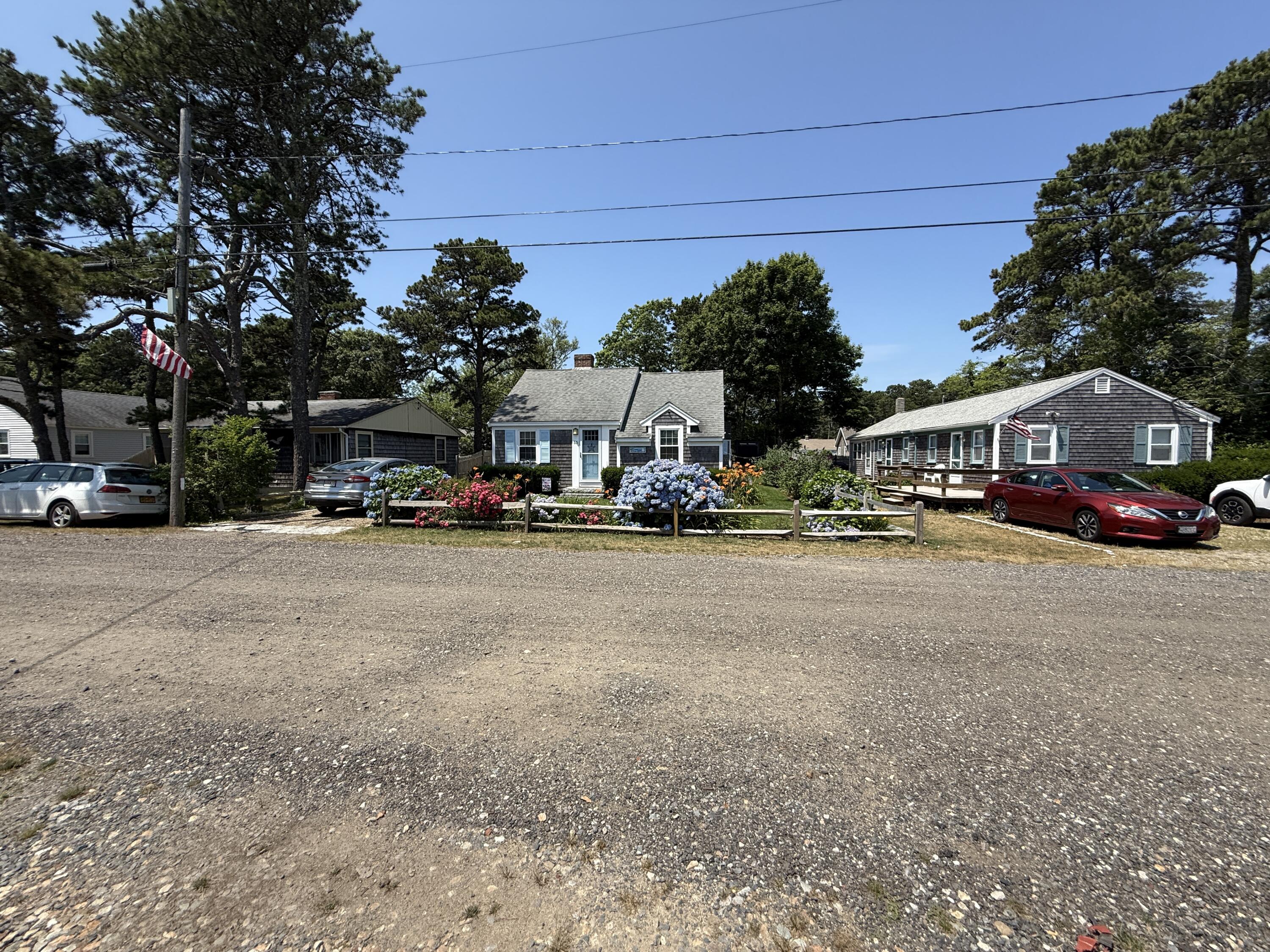 56-58 Uncle Rolf Road Dennis Port, MA 02639 - Photo 43 of 44 a car parked in front of the building