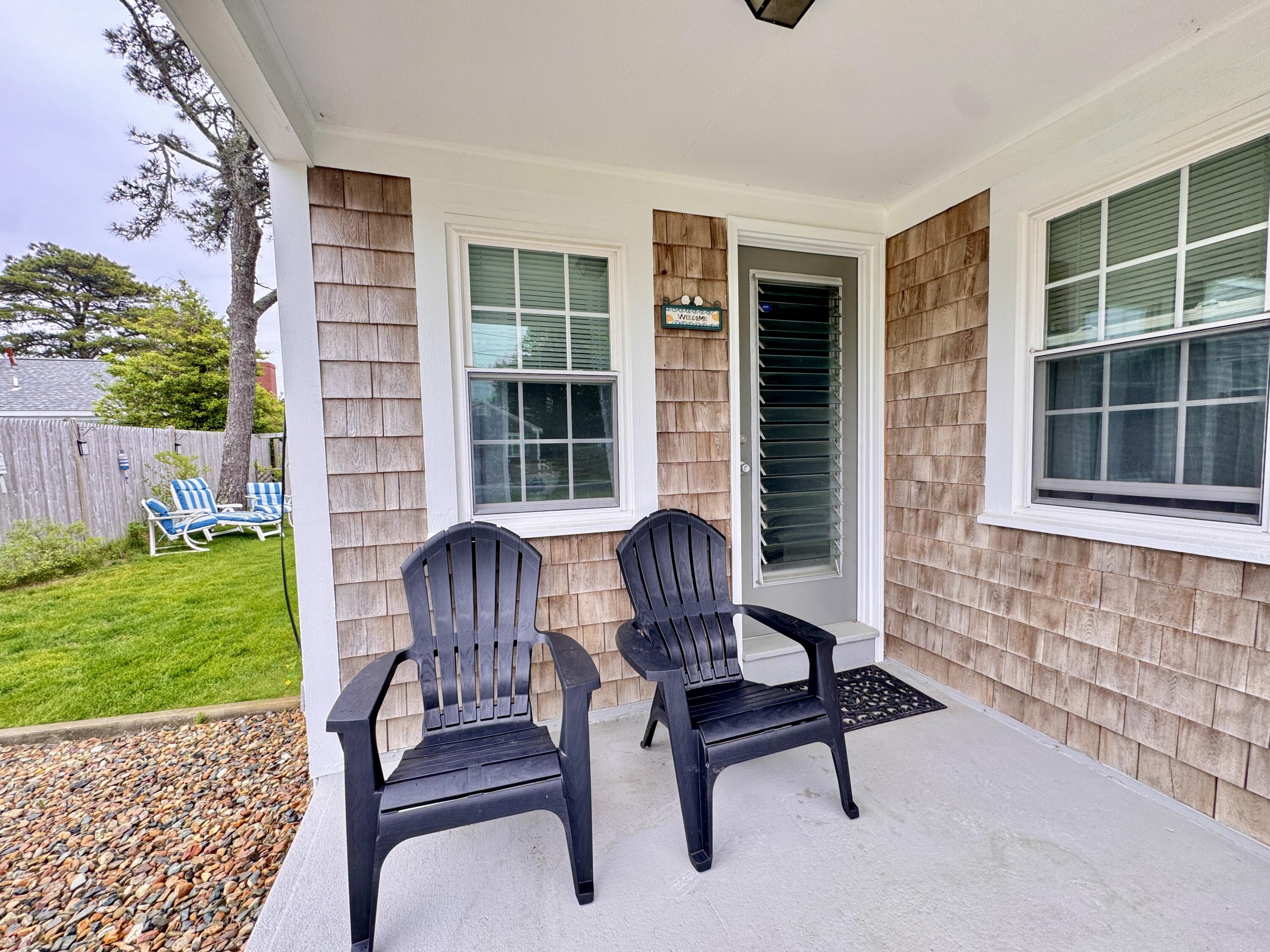 56-58 Uncle Rolf Road Dennis Port, MA 02639 - Photo 8 of 44 a building outdoor space with seating space