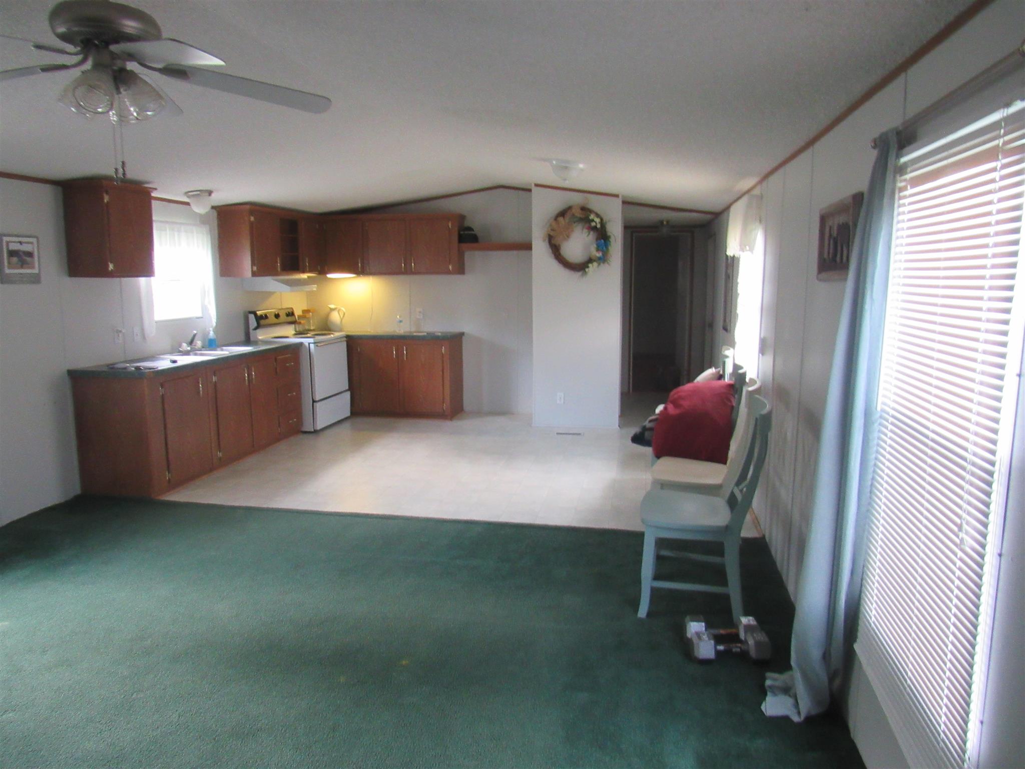 2050 CCC Road McEwen, TN 37101 - Photo 10 of 16 a kitchen with dining table and chairs