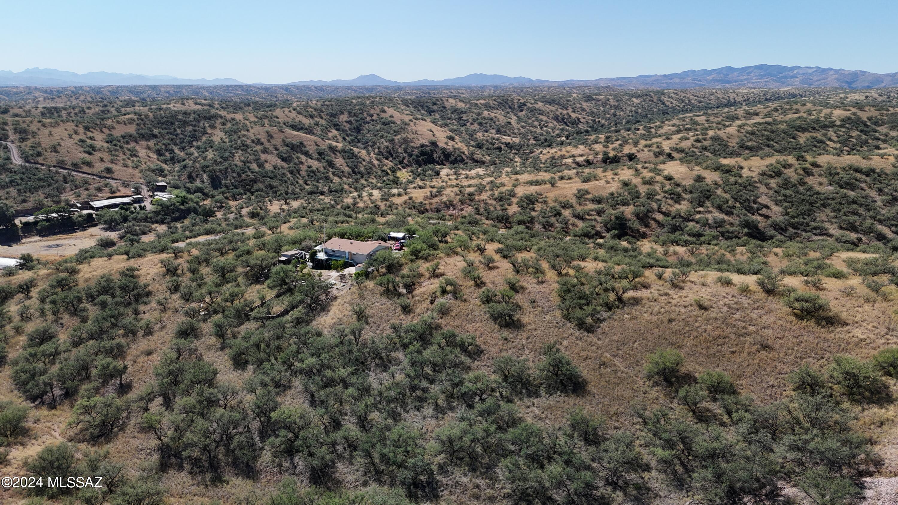 600 Paseo Reforma, Unit 71 Rio Rico, AZ 85648 - Photo 9 of 13 an aerial view of residential house with parking and mountain view
