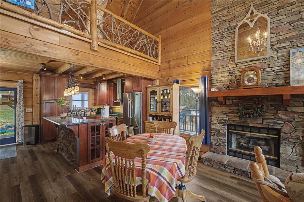 335 Bells Ferry Road Northeast Rome, GA 30161 - Photo 20 of 81 a view of a chairs and table in a patio