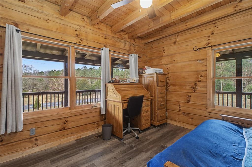 335 Bells Ferry Road Northeast Rome, GA 30161 - Photo 21 of 81 a view of a room with wooden floor and windows