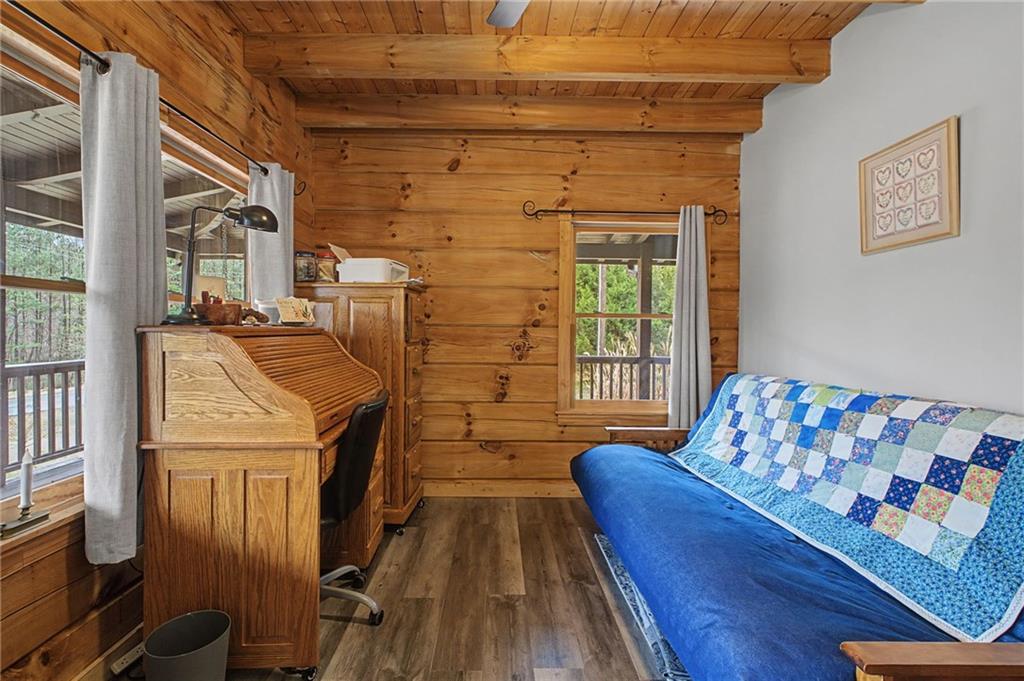 335 Bells Ferry Road Northeast Rome, GA 30161 - Photo 22 of 81 a balcony with wooden floor table and chairs