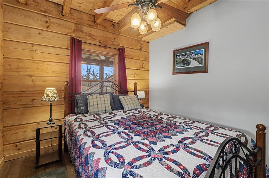 335 Bells Ferry Road Northeast Rome, GA 30161 - Photo 27 of 81 a bedroom with a bed and a window