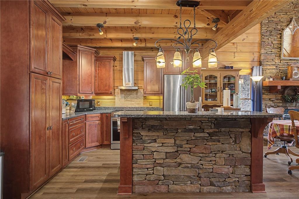 335 Bells Ferry Road Northeast Rome, GA 30161 - Photo 35 of 81 a kitchen with a sink and cabinets
